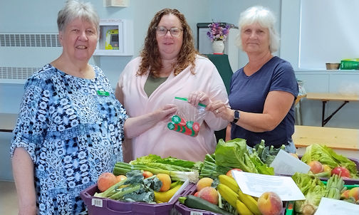 Kincardine Good Food Box program presents tokens to Kincardine Community Living