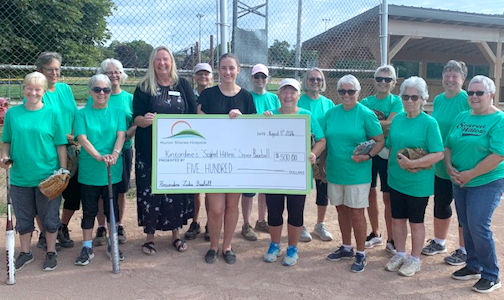 "Scared Hitless" ladies' ball team donates $500 to Huron Shores Hospice